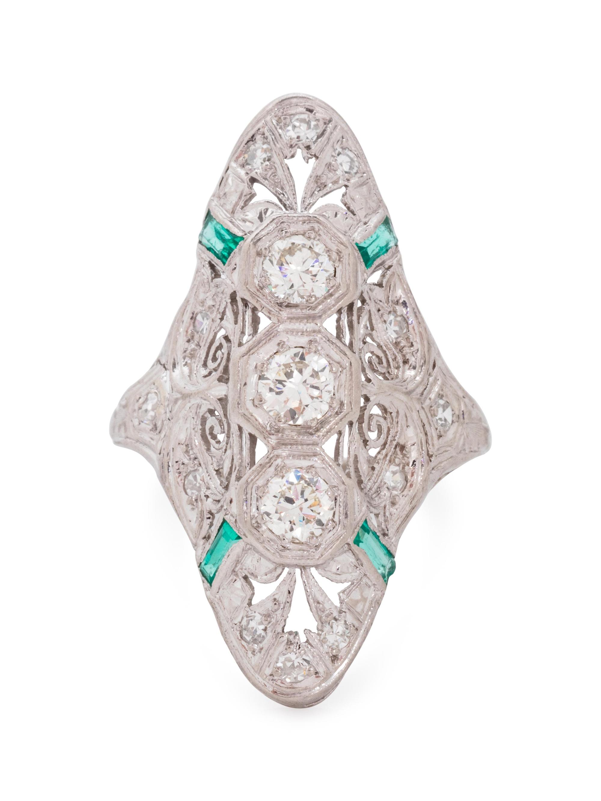 A Platinum, Diamond and Emerald Ring,