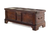 A German Carved and Paneled Walnut Kast