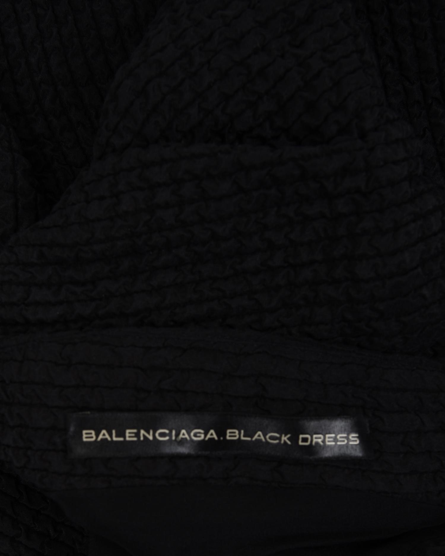 Four Designer Dresses: Two Oscar de la Renta, One Balenciaga, and One Christian Dior, 2000s