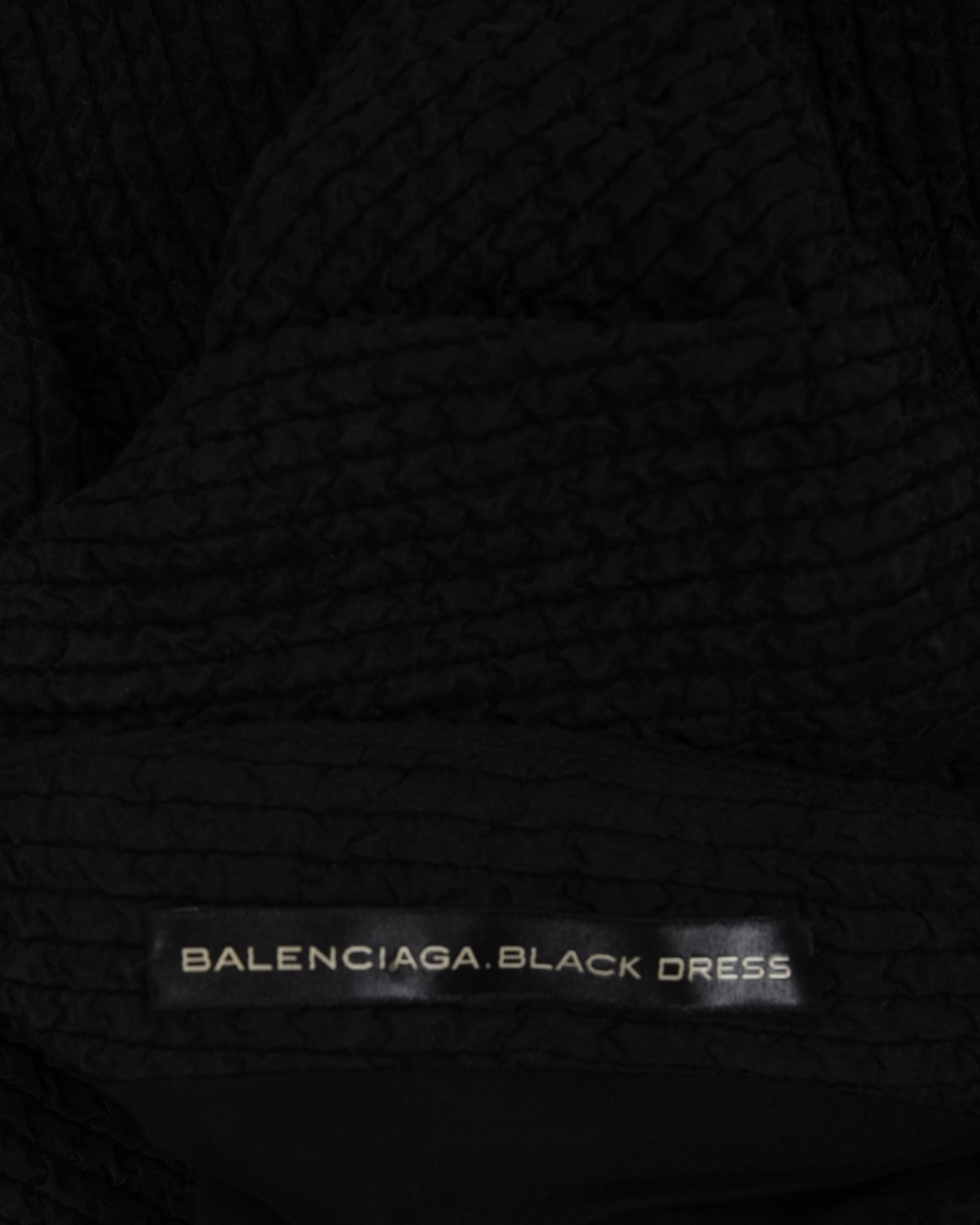 Four Designer Dresses: Two Oscar de la Renta, One Balenciaga, and One Christian Dior, 2000s