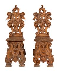 A Pair of Italian Carved Walnut Sgabello Chairs