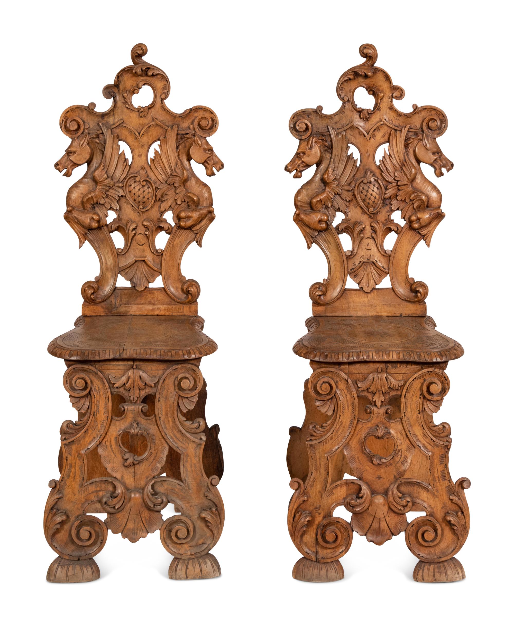 A Pair of Italian Carved Walnut Sgabello Chairs