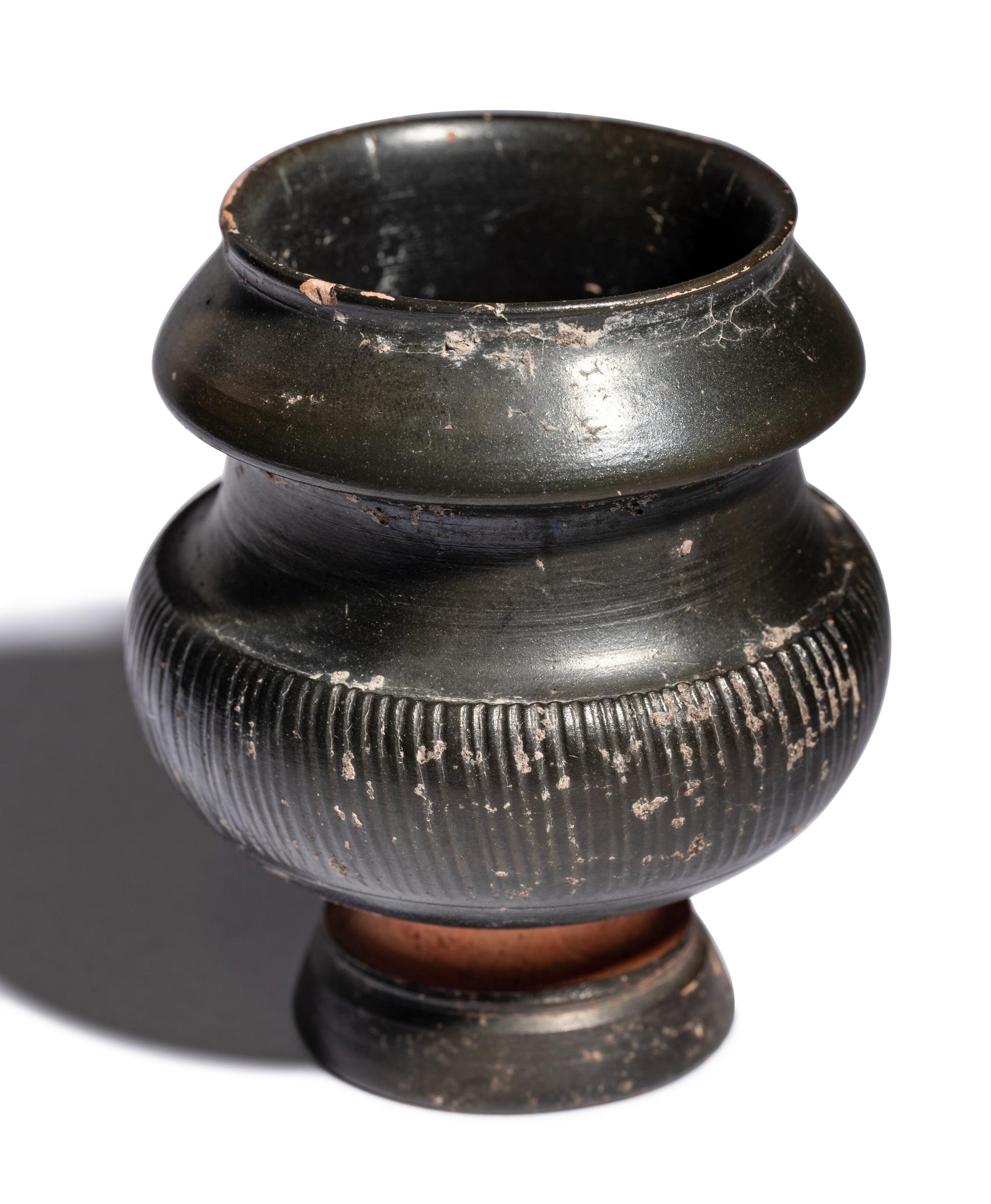 An Apulian Black-Glazed Oinochoe