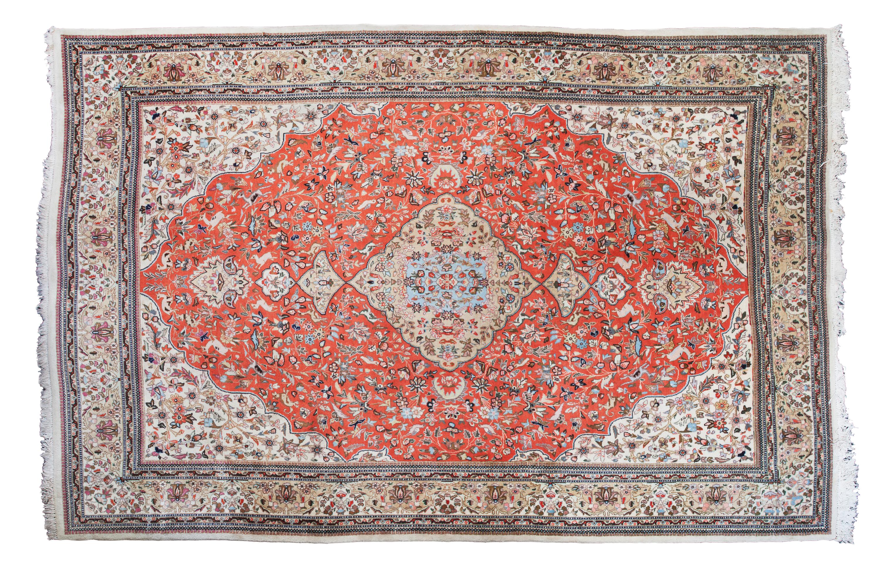 A Tabriz Wool Rug 11 feet 4 inches x 8 feet 4 inches.