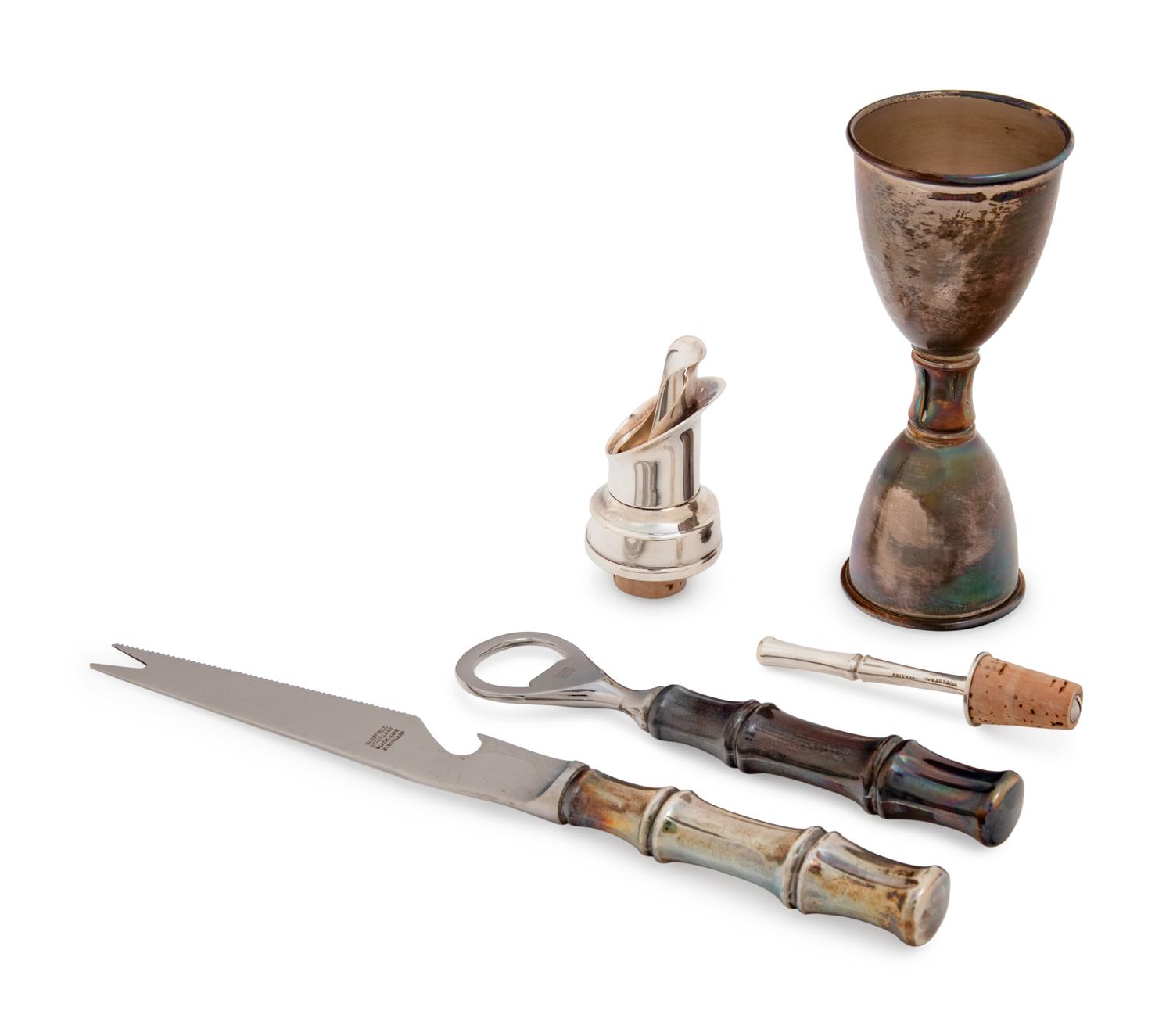 A Group of Four Tiffany & Co Silver Bamboo Pattern Bar Articles