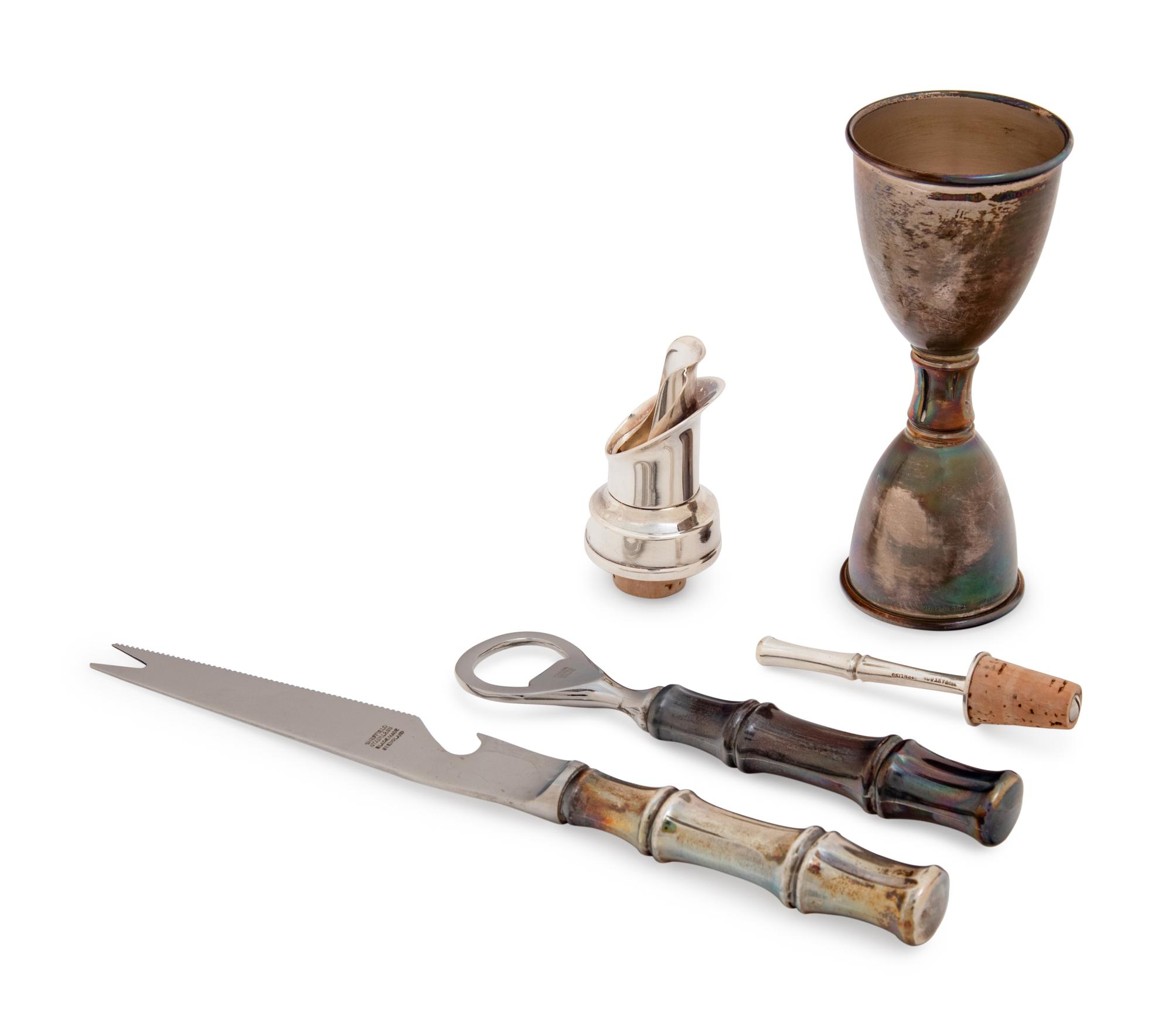 A Group of Four Tiffany & Co Silver Bamboo Pattern Bar Articles