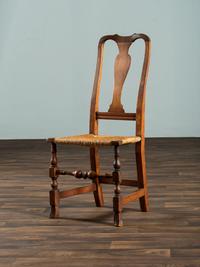 A Queen Anne Maple and Cherrywood Spanish-Foot Rush Seat Side Chair