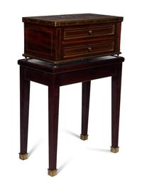 A Directoire Style Mahogany Marble-Top Chest on a Stand