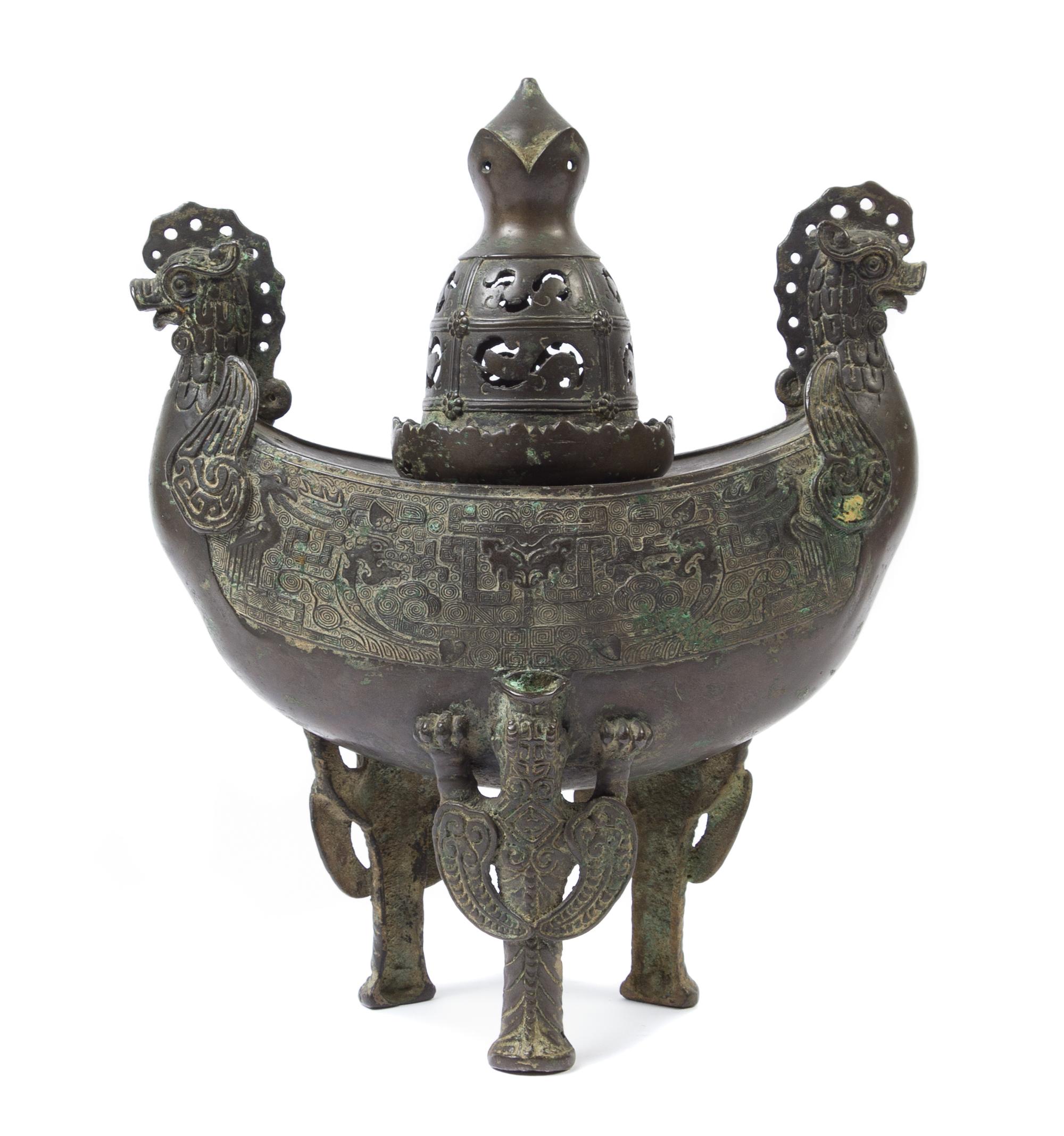 An Unusual Chinese Archaistic Bronze Covered Tripod Censer LATE 19TH CENTURY OR EARLIER Height 13 3/4 inches. — LATE 19TH CENTURY OR EARLIER