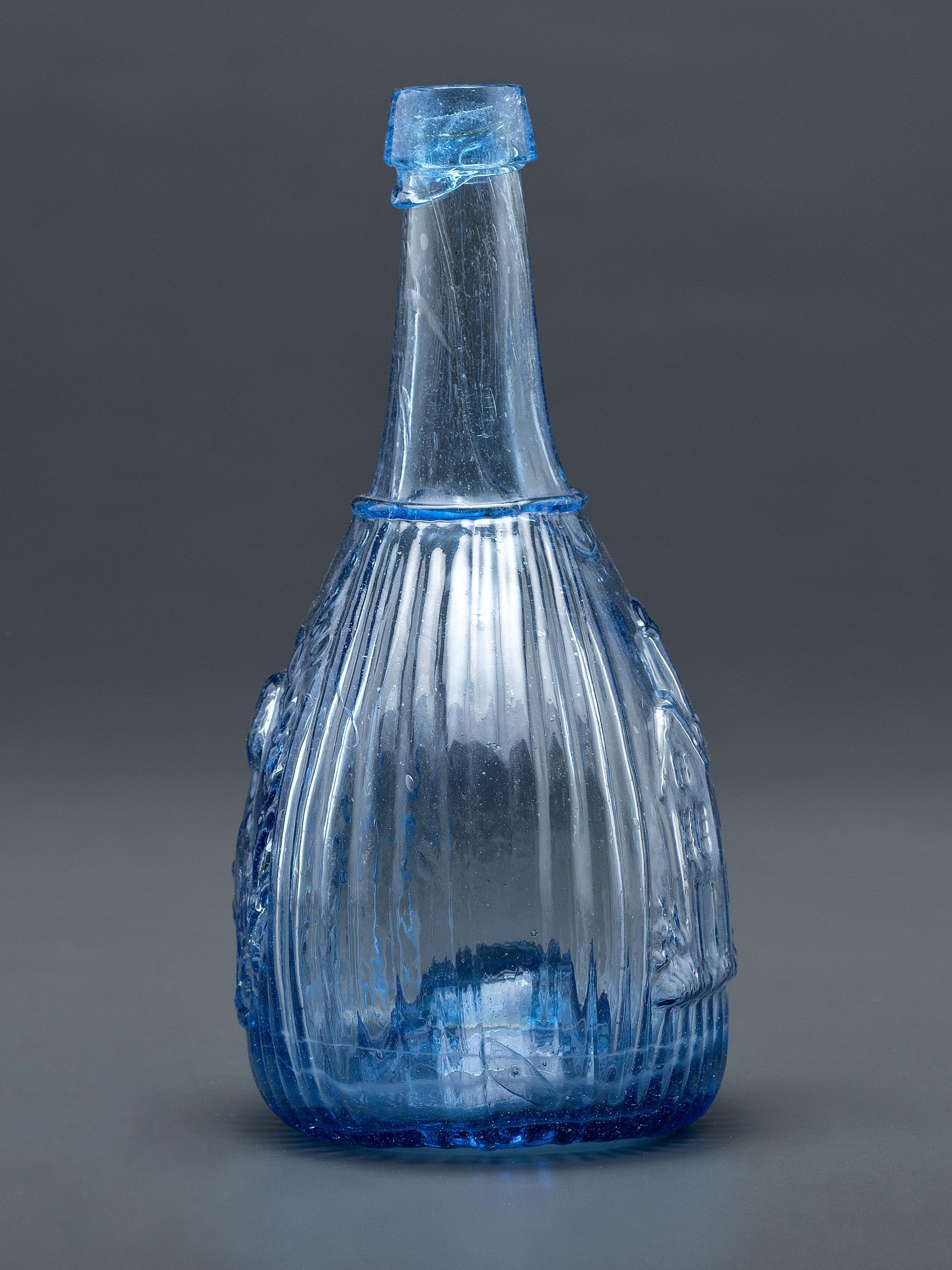 A Molded-Glass New Calabash Bottle in Blue by Whitney Glass Works, Glassboro, New Jersey