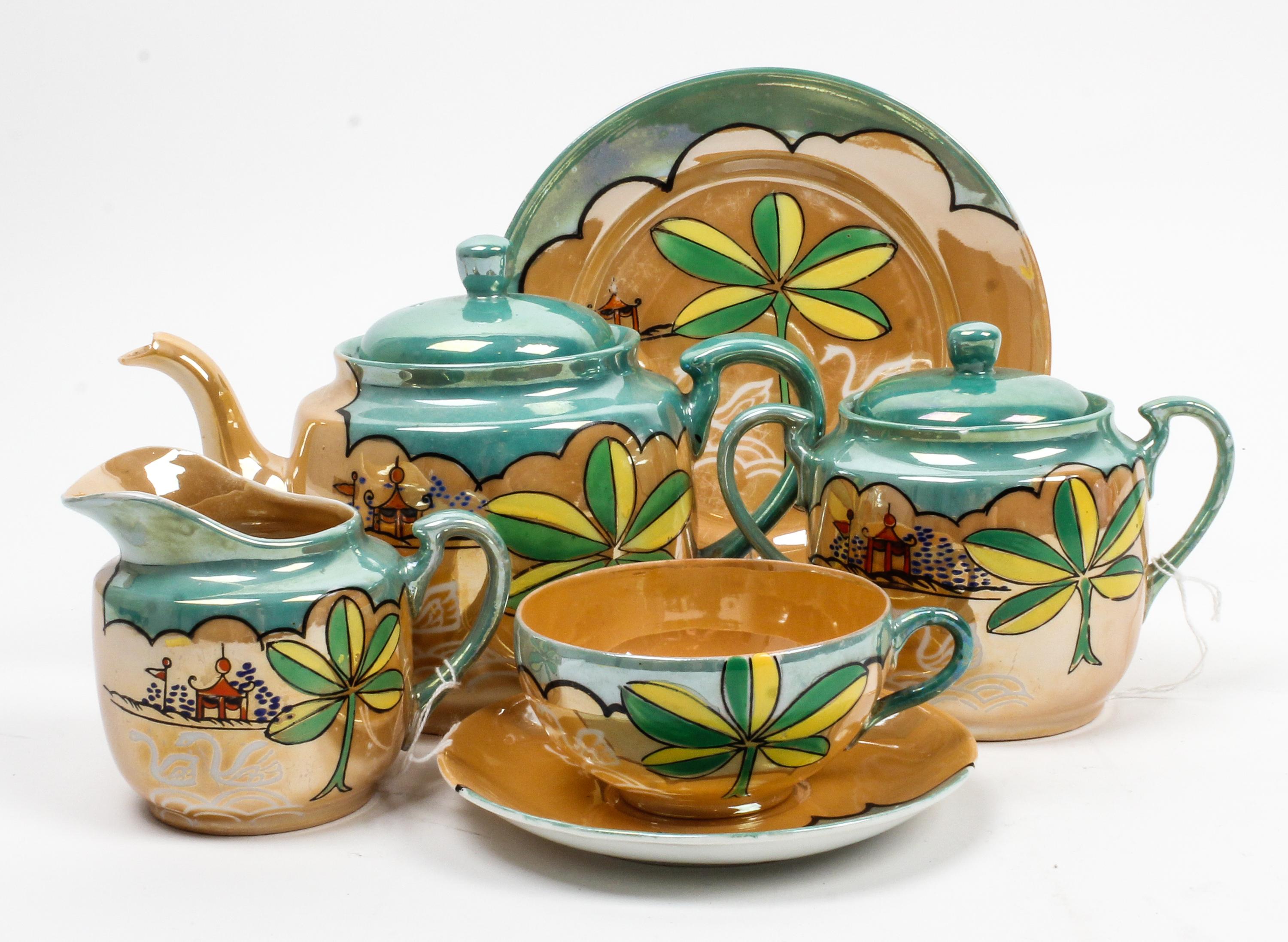 A Japanese Porcelain Tea Service Height of teapot 5 1/2 inches.