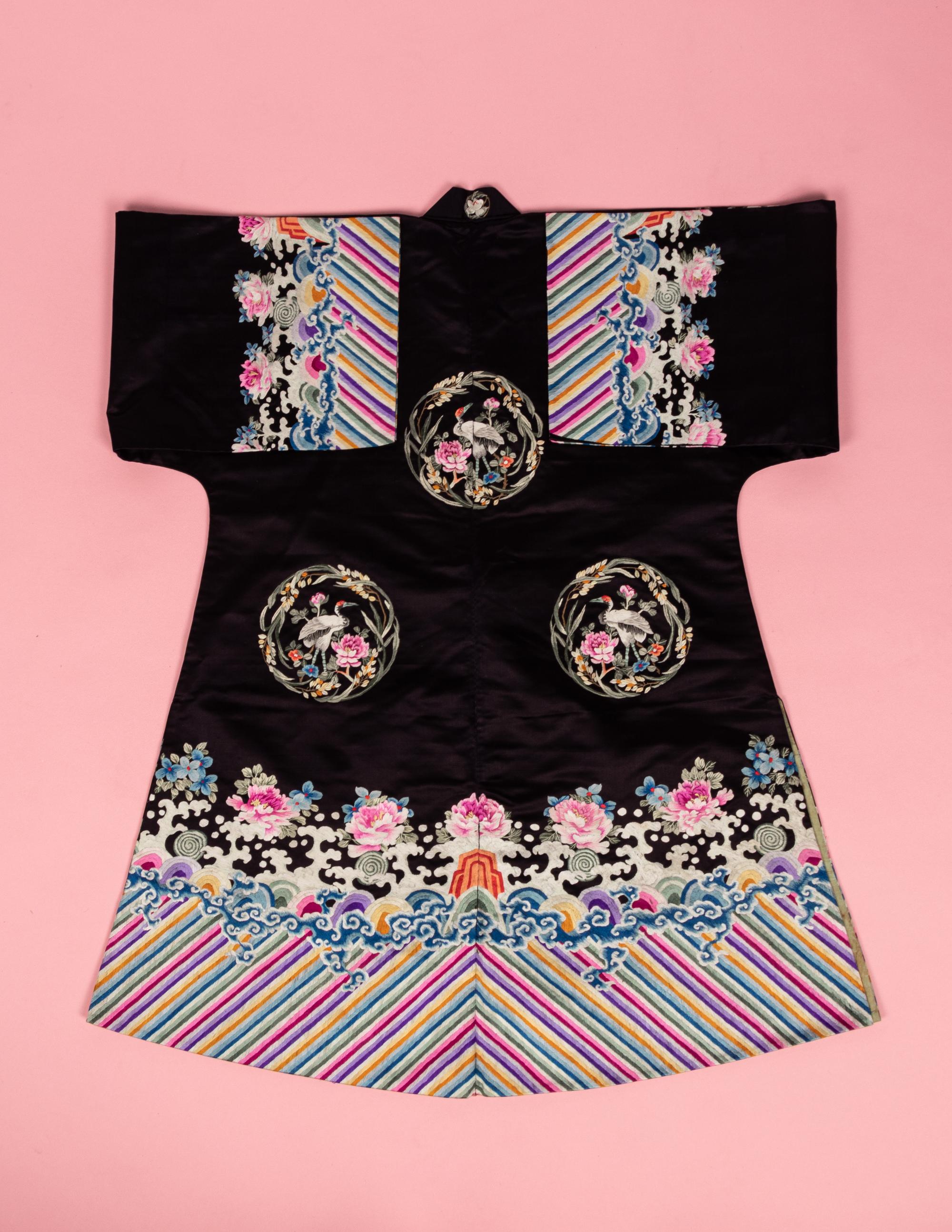 A Set of Aubergine Satin Ground Embroidered Silk Lady's Robe and Skirt