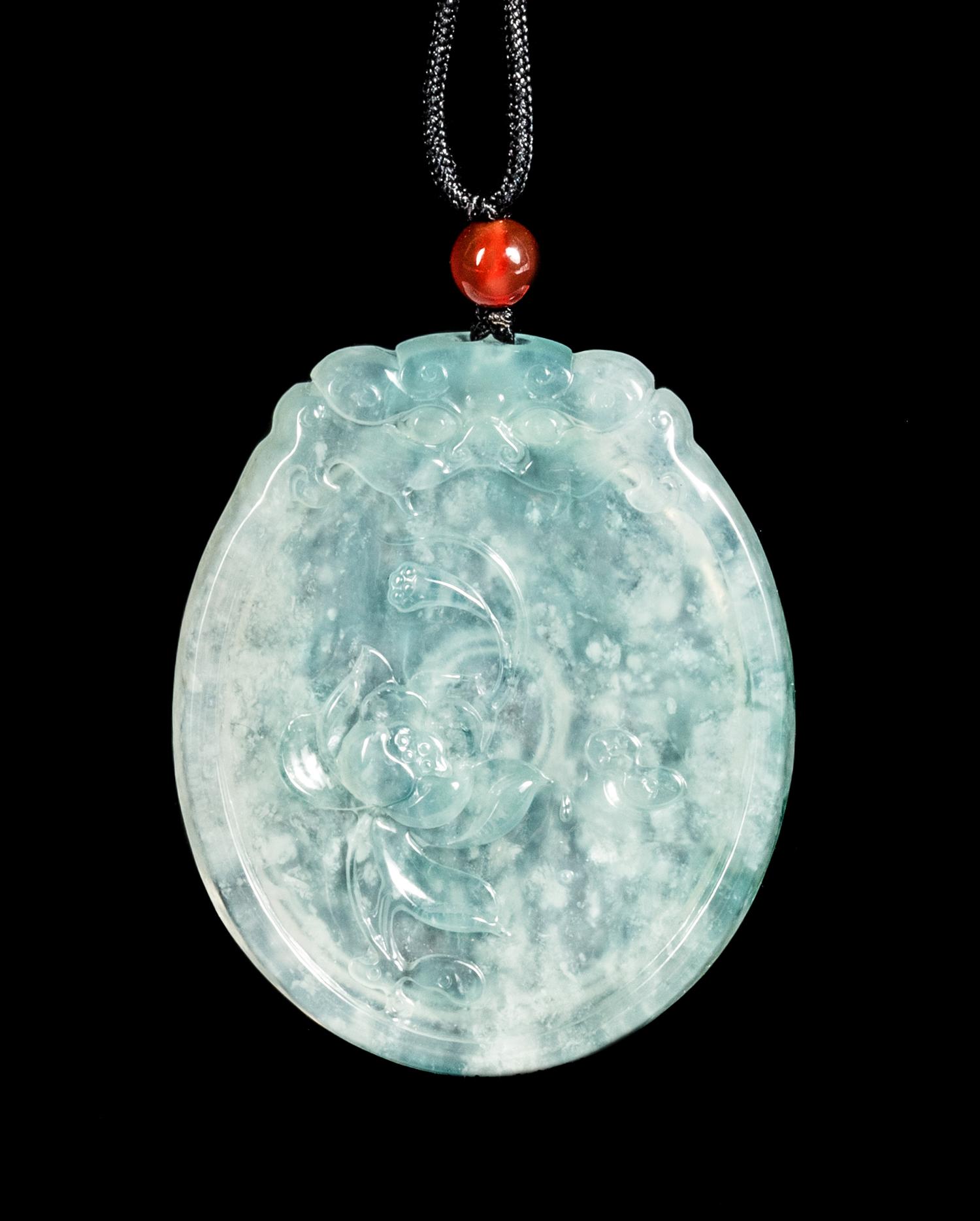 A Jadeite Lotus Pendant Length 2 inches. — 20TH CENTURY