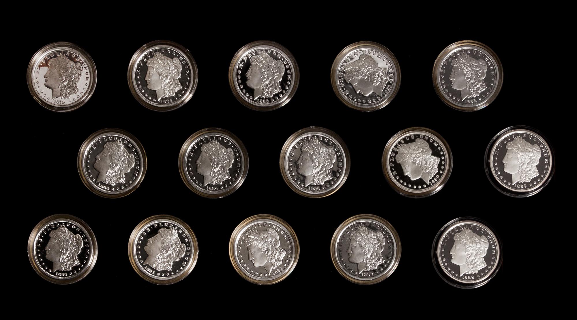 A Group of 15 Reproduction Morgan Silver Dollar 1 Ounce Silver Rounds
