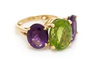 A 14 Karat Yellow Gold, Peridot and Amethyst Ring, 5.95 dwts.