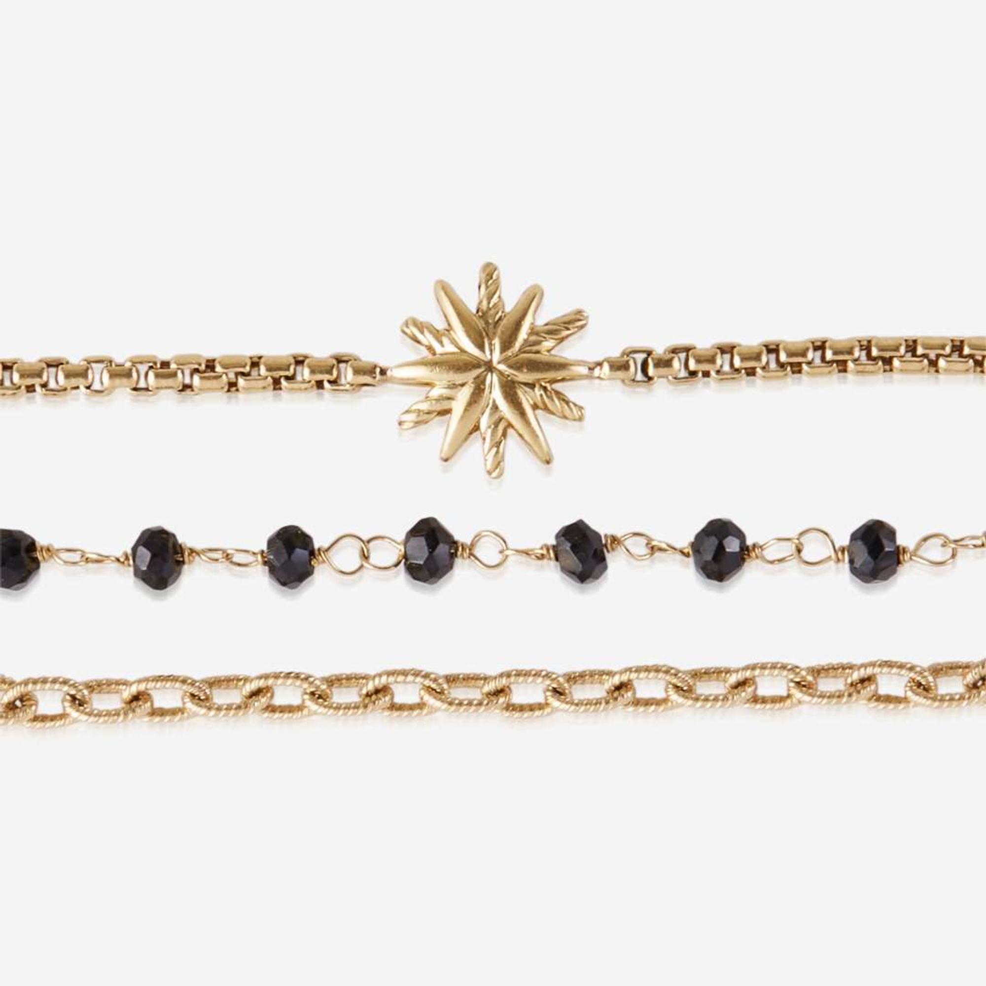 A collection of two gold necklaces, David Yurman and Ippolita