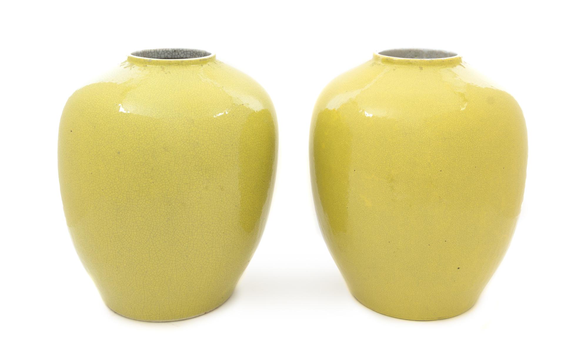 A Pair of Large Chinese Yellow Monochrome Porcelain Jars 19TH CENTURY Height 13 inches. — 19TH CENTURY