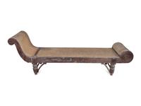 An Indonesian Carved Teak Chaise Longue — 20TH CENTURY
