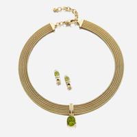 A peridot, diamond, and gold necklace