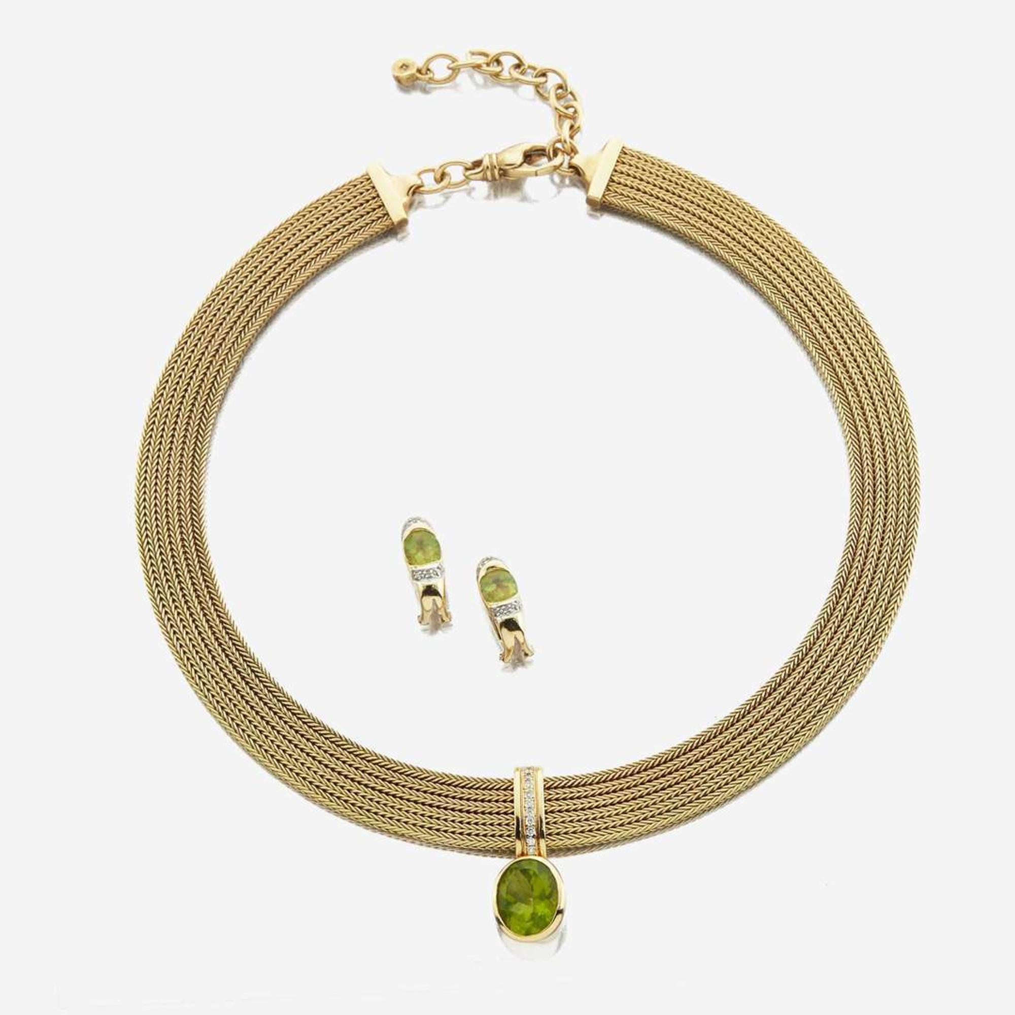 A peridot, diamond, and gold necklace
