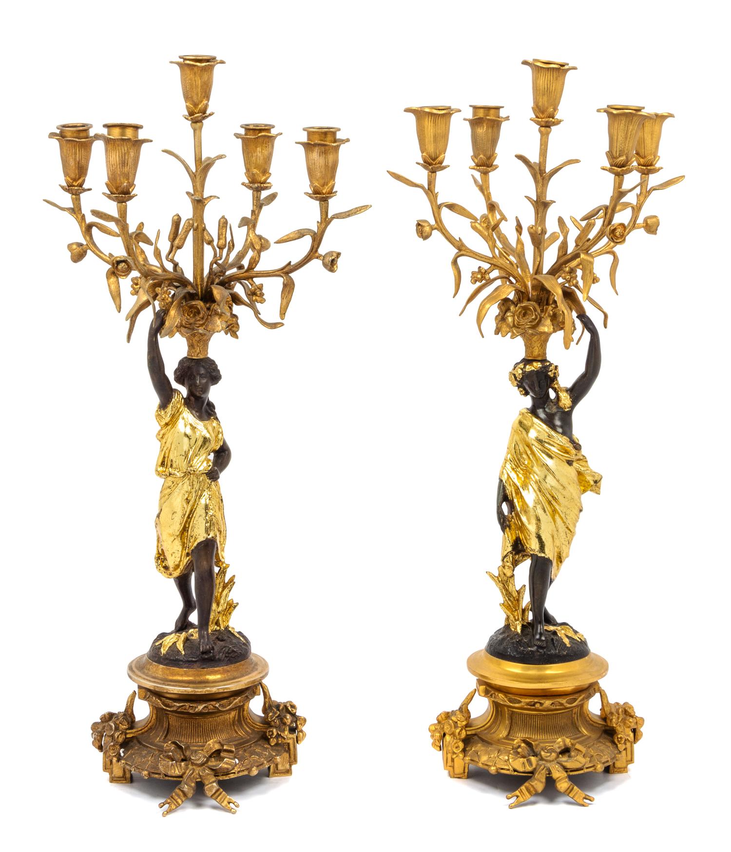 A Pair of Louis XV Style Gilt and Patinated Bronze Figural Five-Light Candelabra Height 22 3/4 inches. — 20TH CENTURY