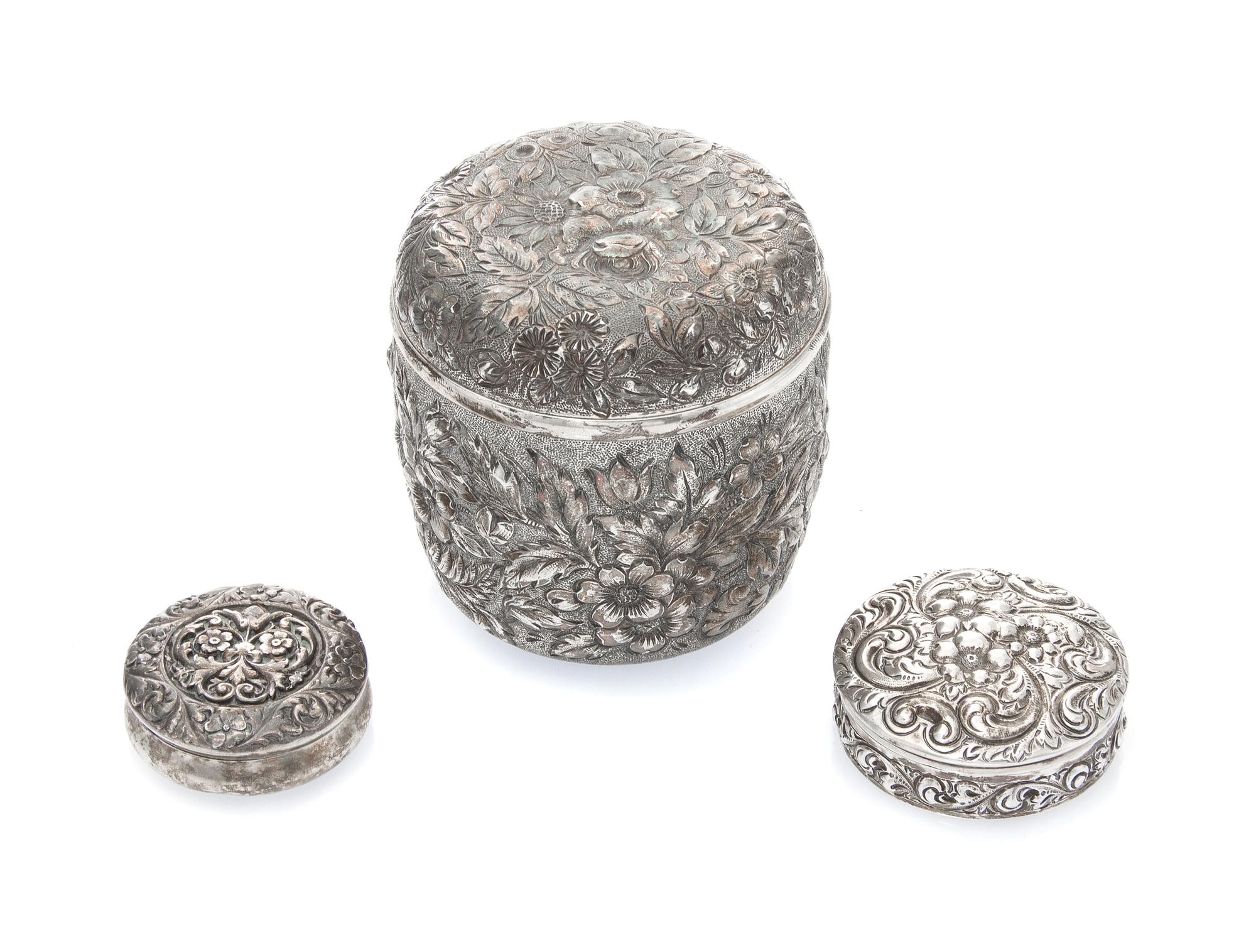 A Group of Three American Silver Boxes, , each decorated with floral and foliate decoration, the two smaller examples with engraved mon