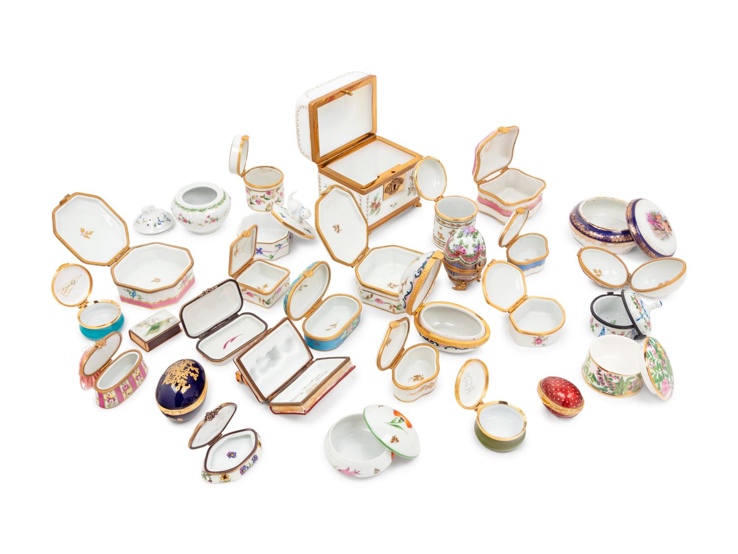 A Collection of Glass, Enameled Metal and Porcelain Small Boxes