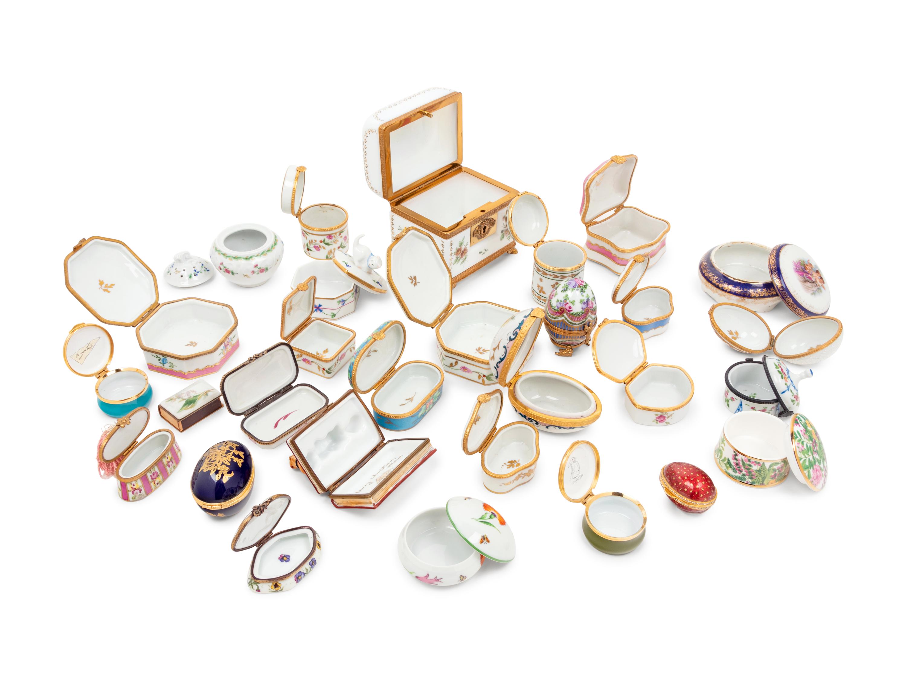 A Collection of Glass, Enameled Metal and Porcelain Small Boxes