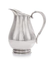 An American Silver Pitcher, International Silver Co., Meriden, CT, in the Royal Danish pattern, of baluster form, the handle having ban