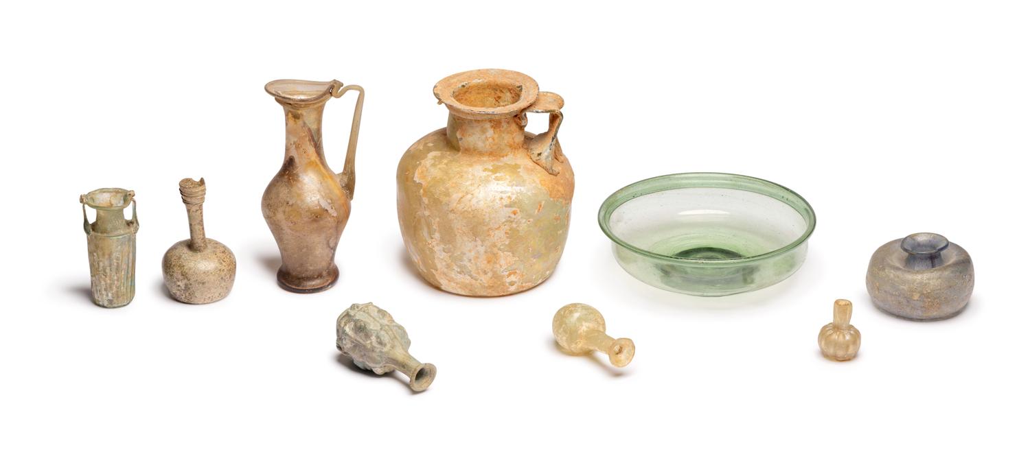 A Group of Nine Roman, Sidonian, and Islamic Glass Vessels
