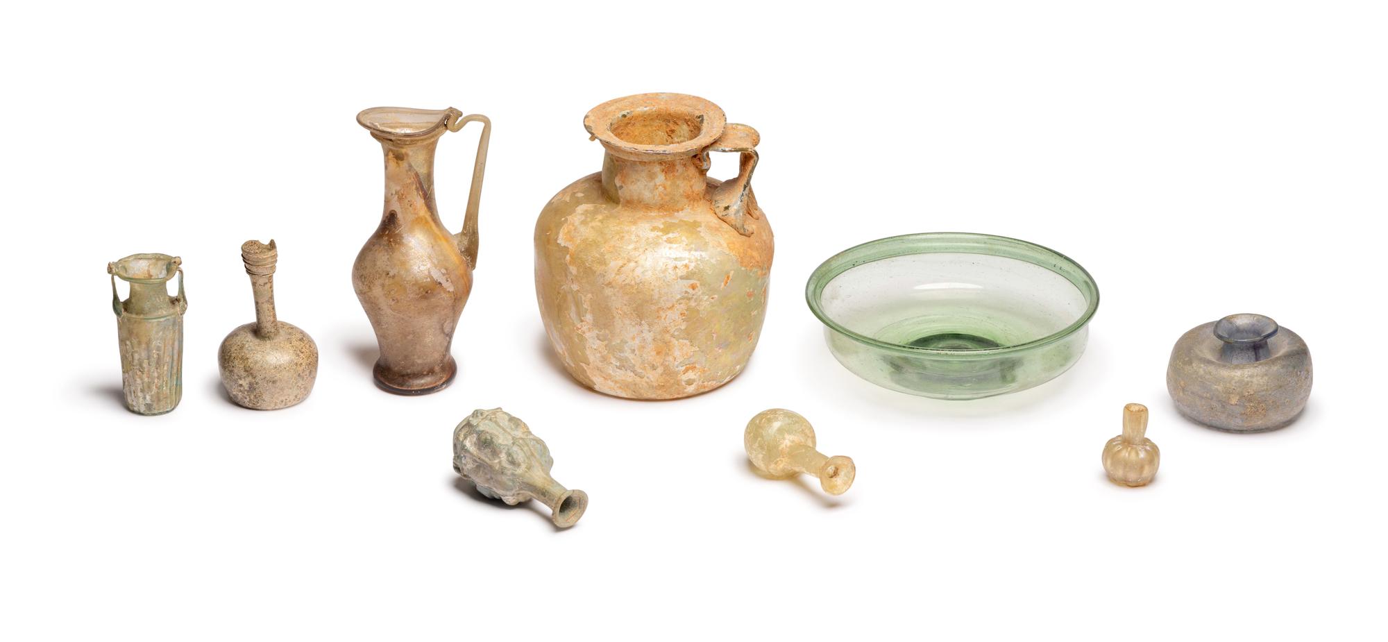 A Group of Nine Roman, Sidonian, and Islamic Glass Vessels