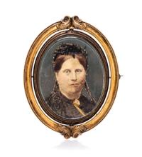 A Victorian Gilt Metal Portrait Brooch Height 2 7/8 inches.