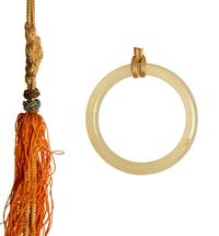 A Pair of Carved Jade Medallion and Tasseled Wall Hangings