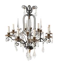 A French Style Parcel Gilt Metal and Glass Eight-Light Chandelier