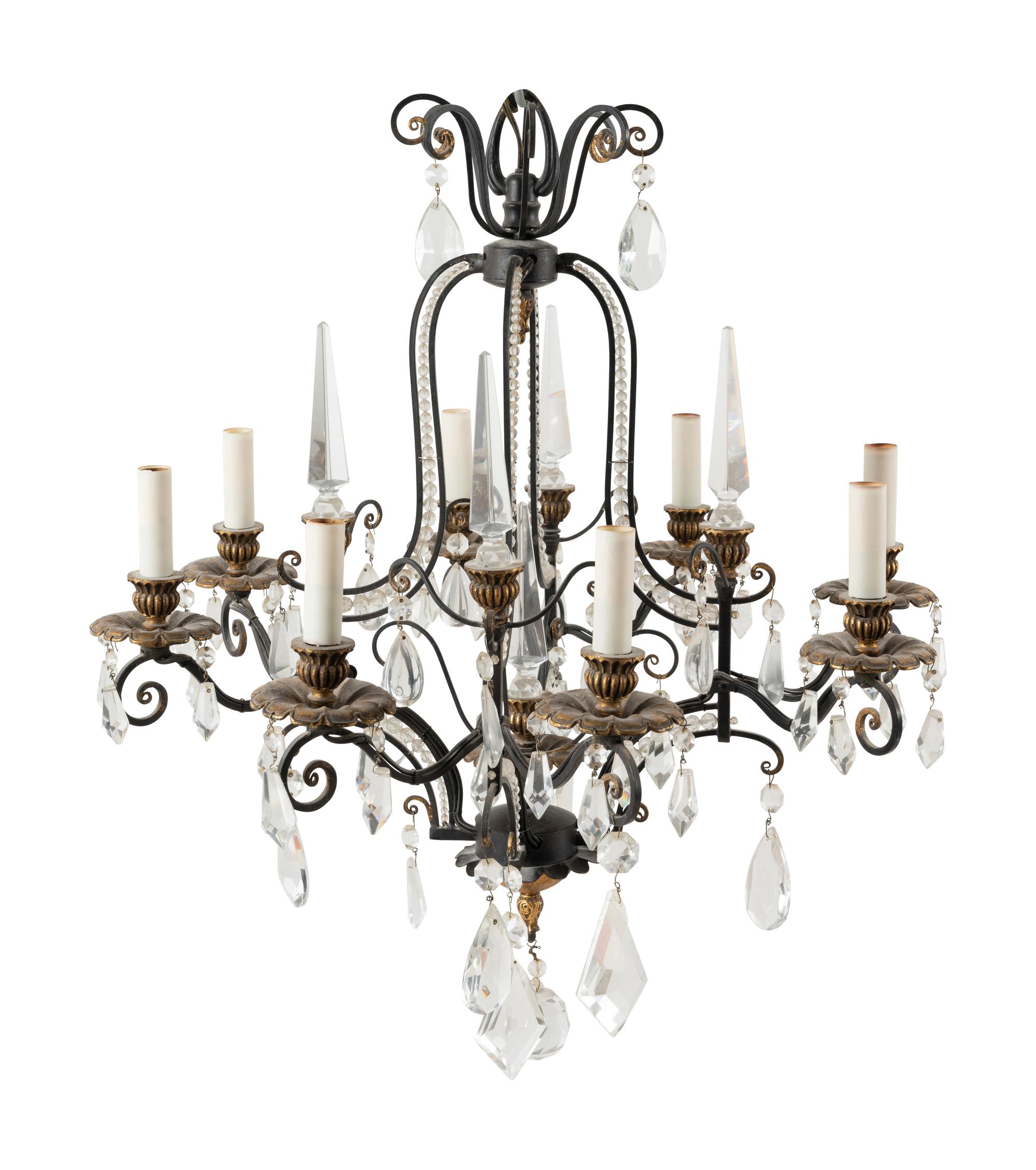 A French Style Parcel Gilt Metal and Glass Eight-Light Chandelier