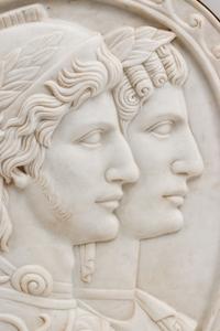 An Italian Carved Marble and Iron Mounted Double Profile Plaque