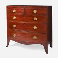A George III bowfront mahogany chest of drawers circa 1790