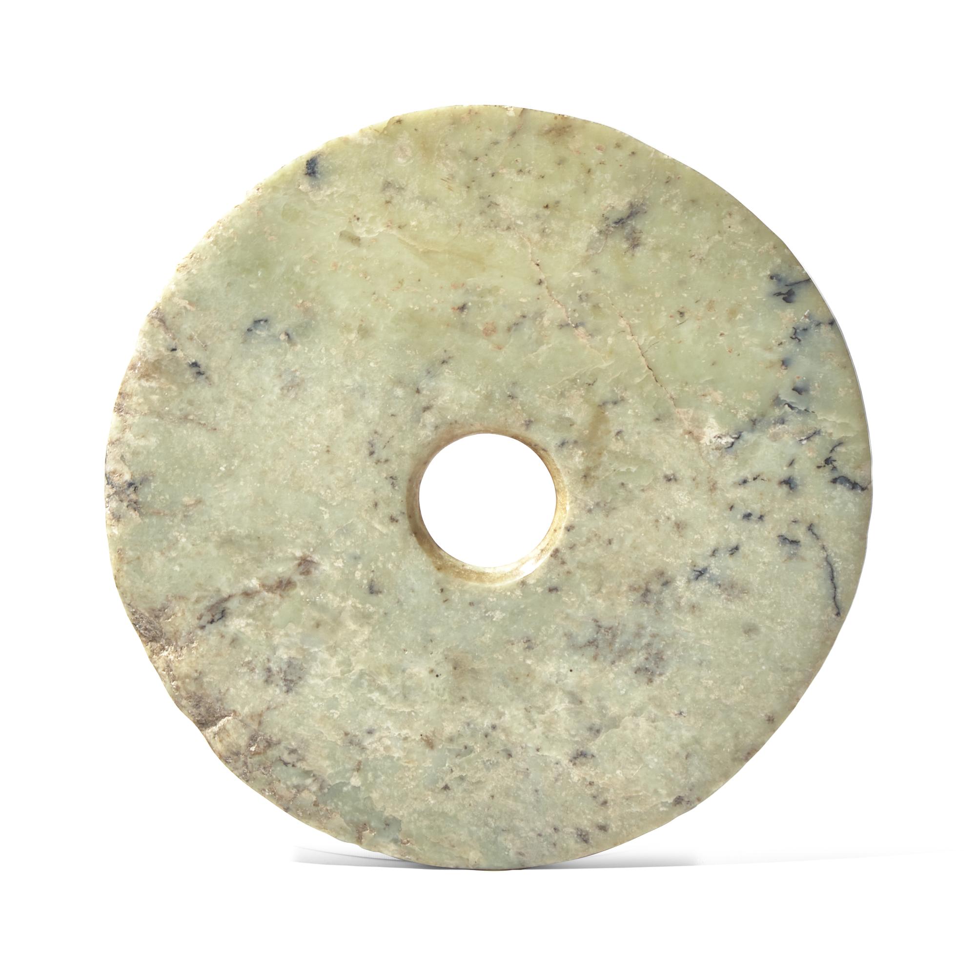 A Chinese Archaistic Mottled Pale Green Jade Bi Disc