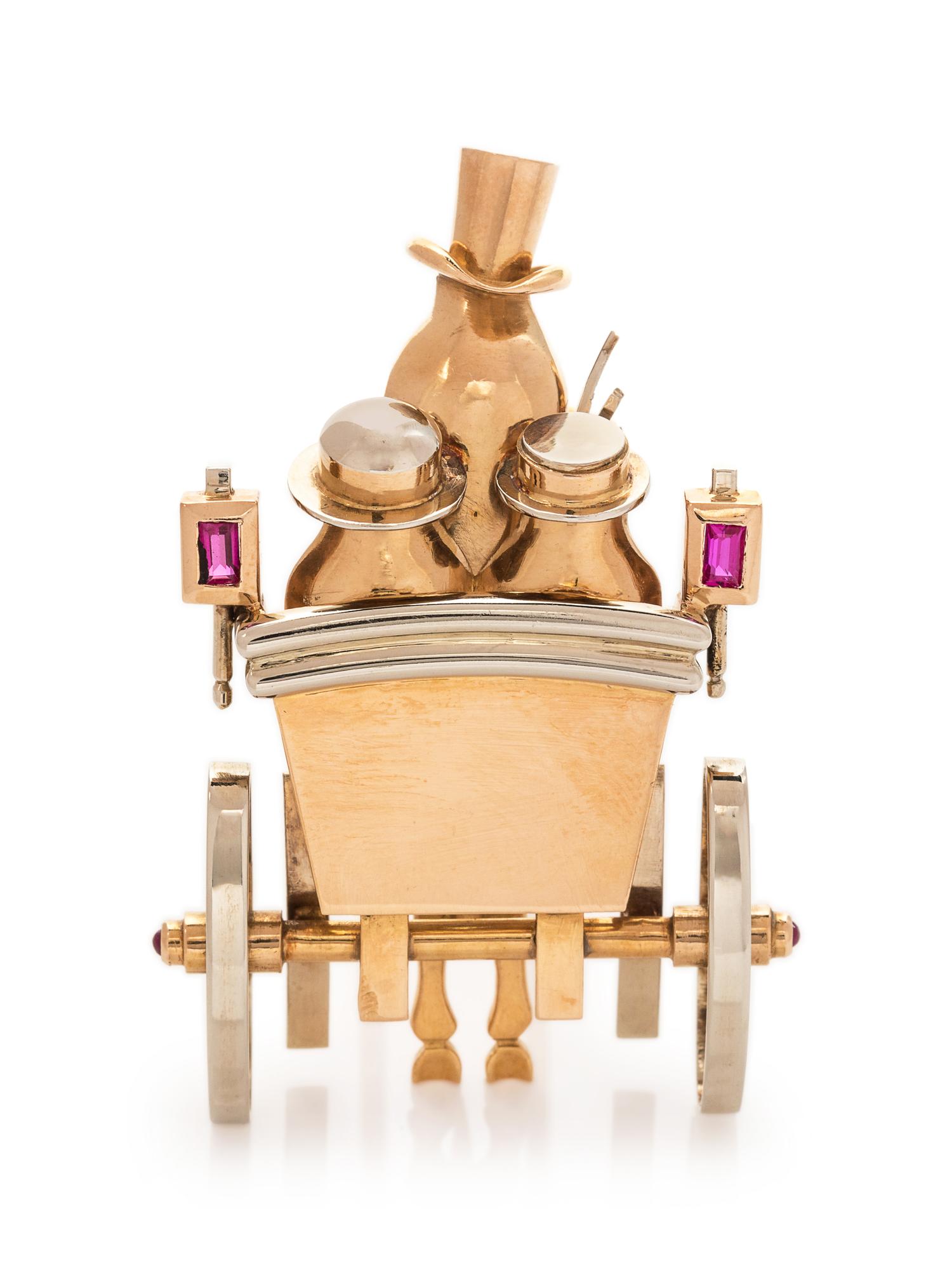 A Retro Bicolor 18 Karat Gold and Ruby Carriage Motif Brooch, Andre Col,
