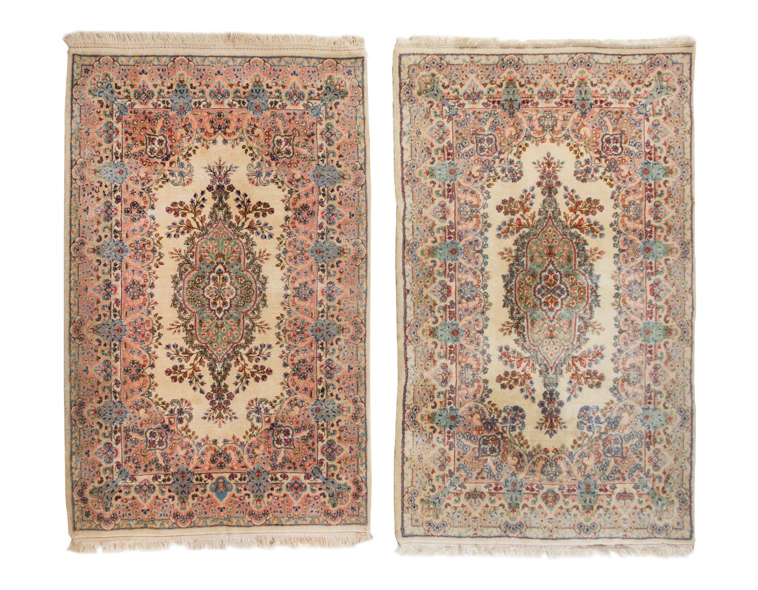 A Pair of Kirman Wool Rugs