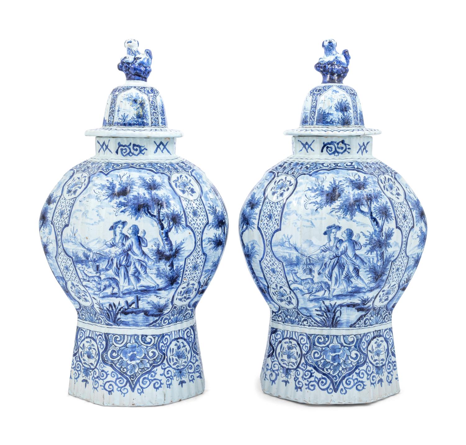 A Pair of Large Delftware Vases and Covers
