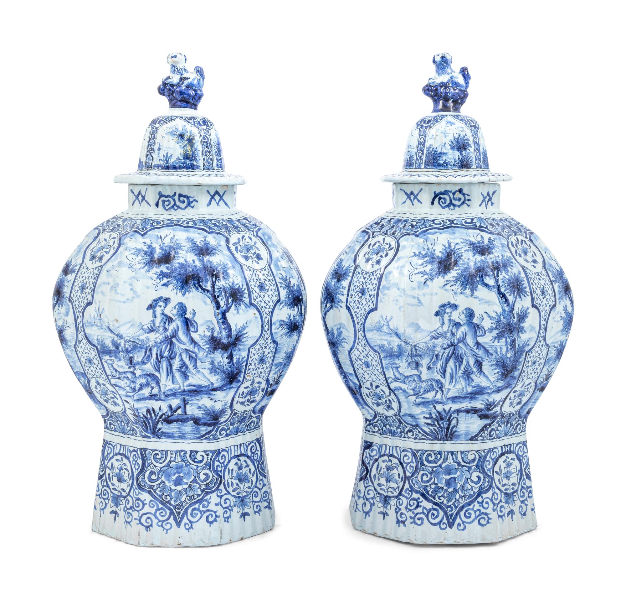 A Pair of Large Delftware Vases and Covers