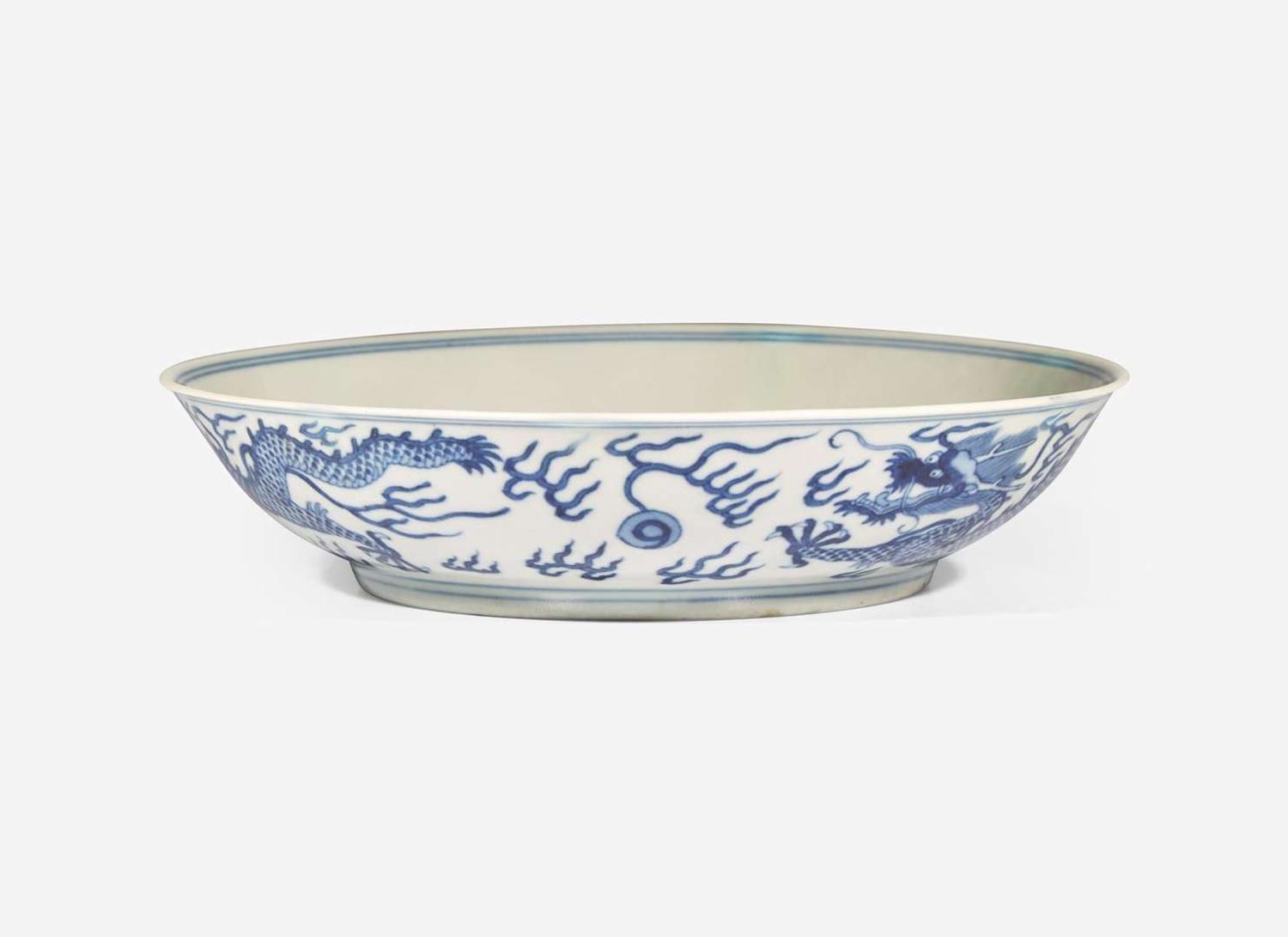 A Chinese blue and white porcelain "Dragon" dish, Jiaqing mark and of the period 青花雲龍紋盤 嘉慶款 清 嘉慶