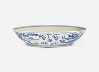 A Chinese blue and white porcelain "Dragon" dish, Jiaqing mark and of the period 青花雲龍紋盤 嘉慶款 清 嘉慶