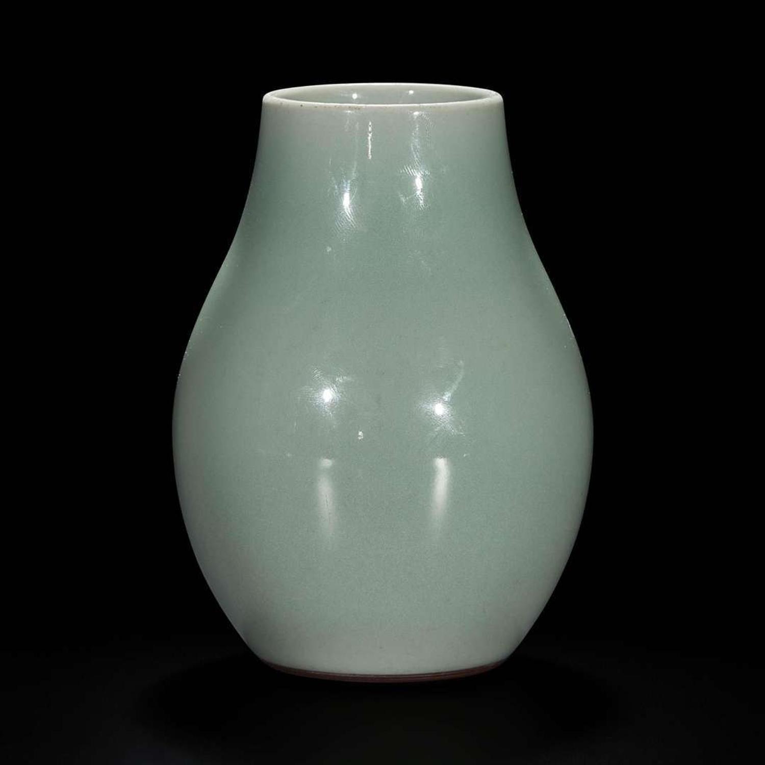A small Chinese celadon-glazed oviform vase 粉青釉觯一件 Six-character Qianlong seal mark and possibly of the period ????? ?? ??