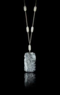 A Grey and White Jade Pendant — 18TH/19TH CENTURY