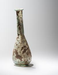 A Roman Pale Blue Glass Unguentarium