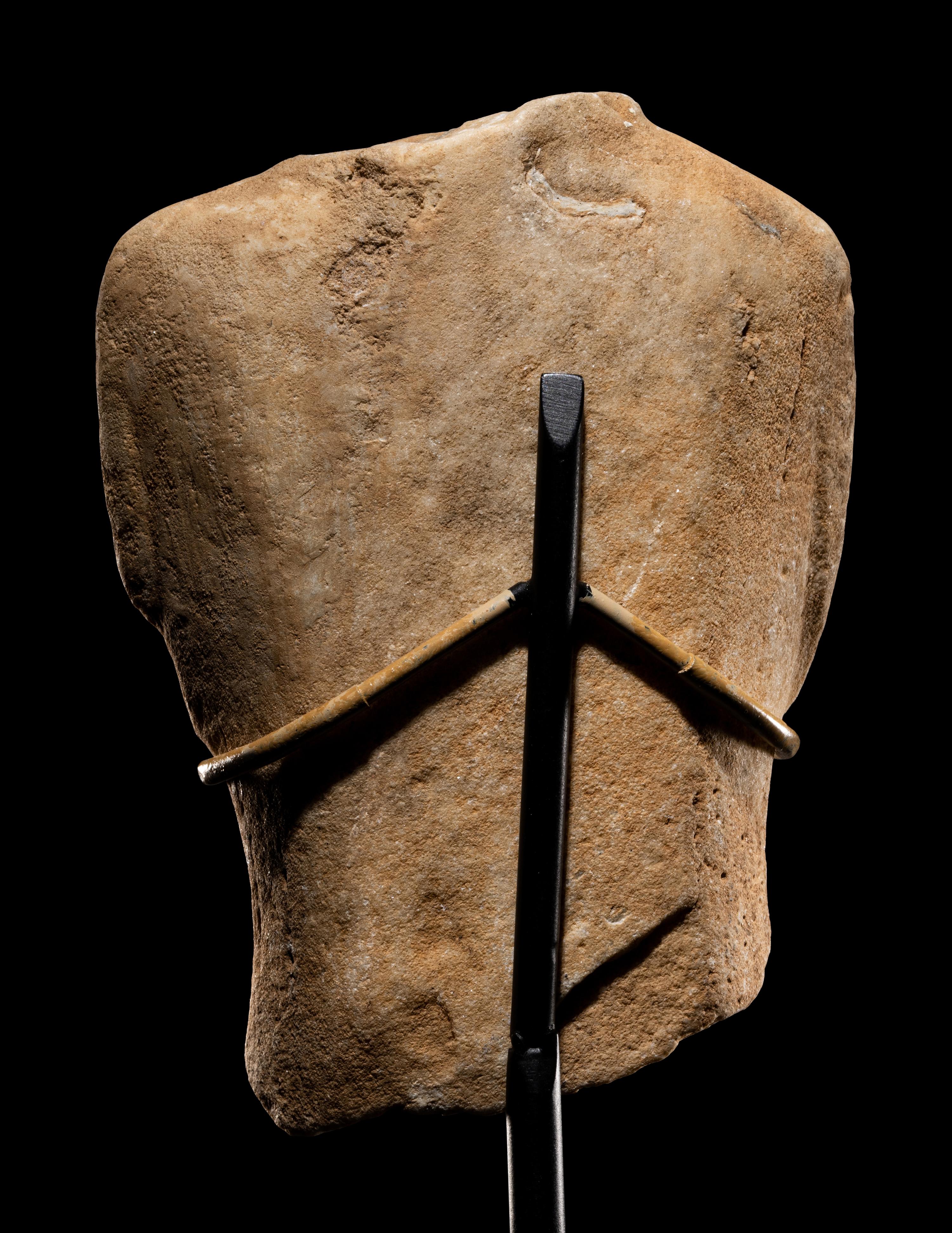 A Cycladic Marble Torso