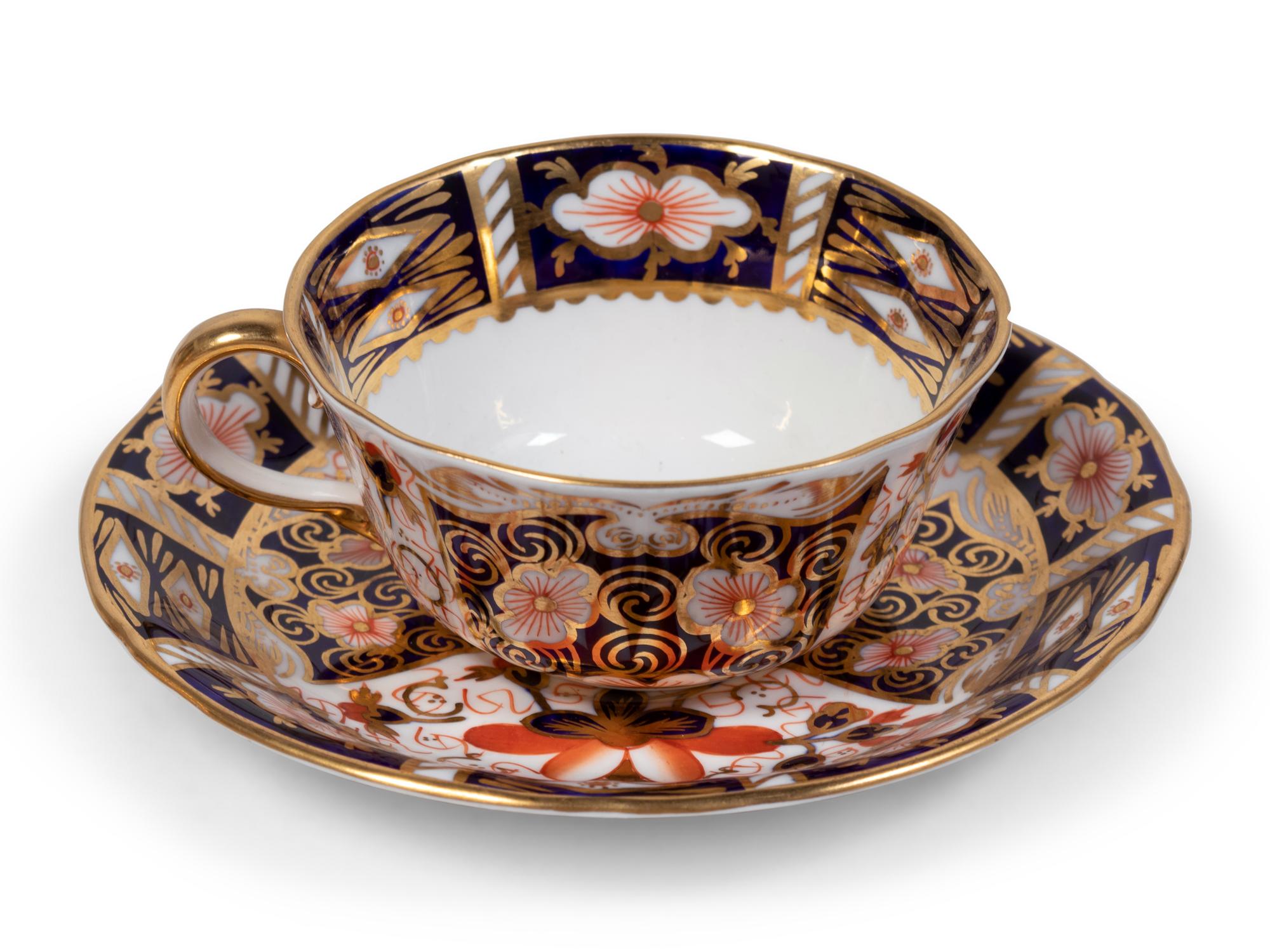 A Royal Crown Derby Porcelain Dinner Service