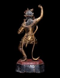 A Tibetan Gilt Lacquered Wood Figure of a Dancing Deity